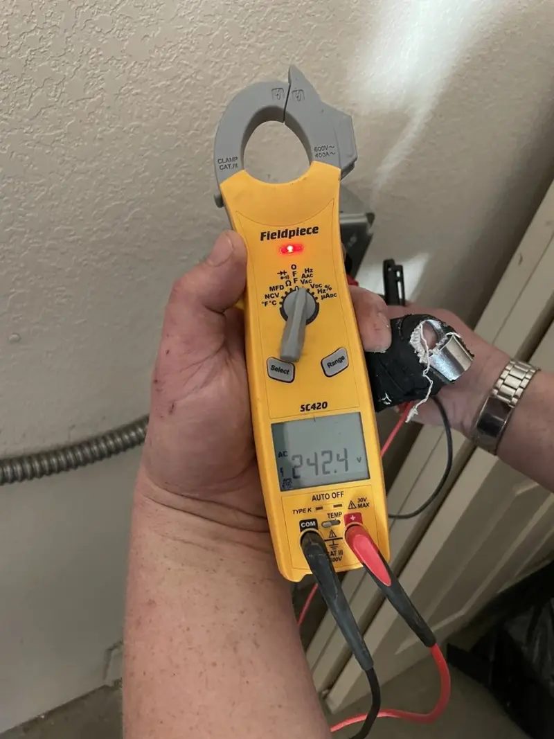 Voltage testing with clamp meter during Generator Installation in Woodland